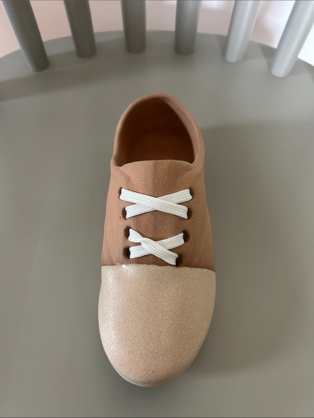Ceramic lace up shoe for hanging